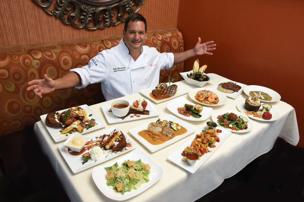 Chef John Varanese plating dishes